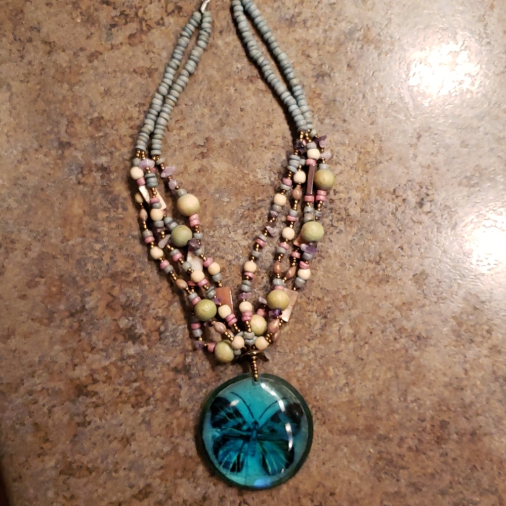 Beautiful beaded necklace with butterfly pendant